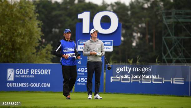 Ricardo Gouveia of Portugal waits to play his first shot on the 10th tee during the Porsche European Open - Day One at Green Eagle Golf Course on...