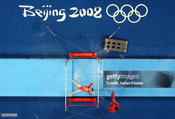 Kiko Tsurumi of Japan competes in the uneven bars artistic gymnastics event at the National Indoor Stadium on Day 7 of the Beijing 2008 Olympic Games...