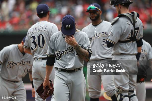 Starting pitcher Michael Blazek of the Milwaukee Brewers is relived in the third inning against the Washington Nationals at Nationals Park on July...