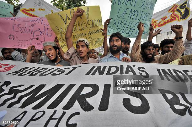 Pakistani Kashmiri march to shows solidarity with Indian Kashmiri during a protest in Lahore on August 15, 2008 on the Indian Independence Day. The...
