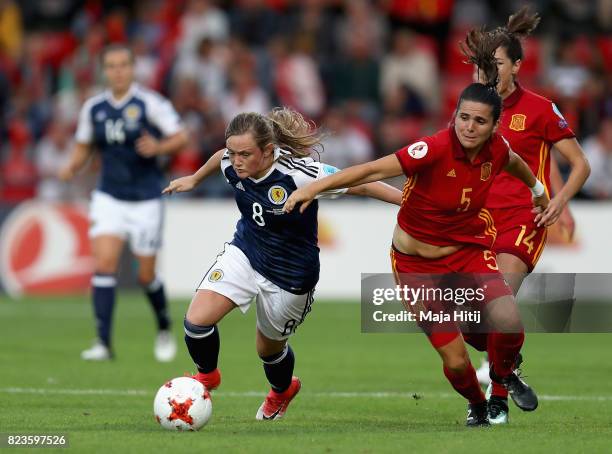 Erin Cuthbert of Scotland and Andrea Pereira of Spain battle for possession during the Group D match between Scotland and Spain during the UEFA...