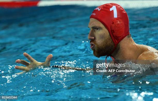 Hungarian goalkeeper Viktor Nagy reacts against Greece in 'Hajos Alfred' swimming pool of Budapest on July 27, 2017 during a semifinal match of...