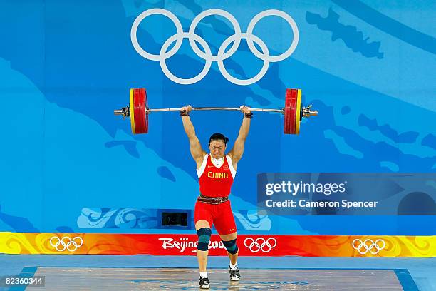 Cao Lei of China competes in the women's 75kg weightlifting event at the Beijing University of Aeronautics & Astronautics Gymnasium on Day 7 of the...