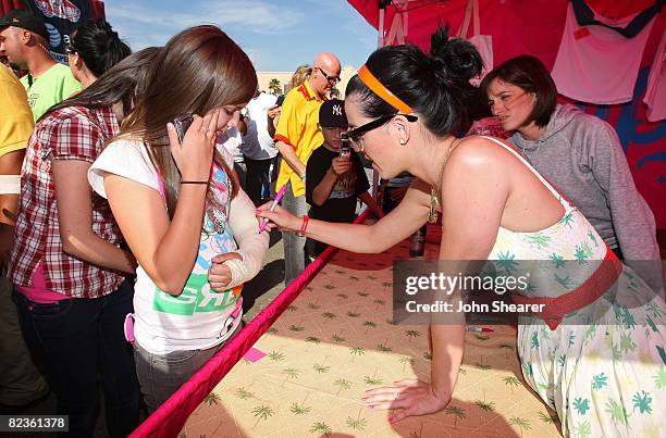 Katy Perry signs autographs at the Van's Warped Tour at Seaside Park on June 22, 2008 in Ventura, California.