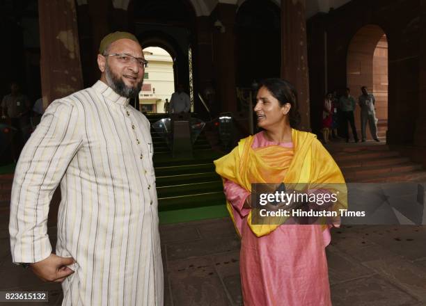 President of the All India Majlis-e-Ittehadul Muslimeen Asaduddin Owaisi talking to Congress MP from Supaul, Bihar Ranjeet Ranjan at the Parliament...