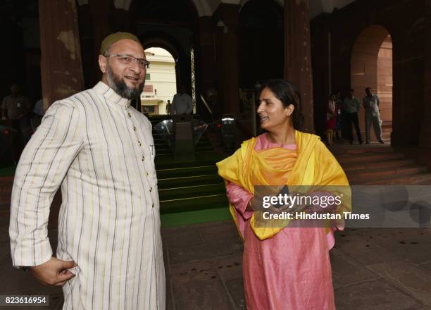 President of the All India Majlis-e-Ittehadul Muslimeen Asaduddin Owaisi talking to Congress MP from Supaul, Bihar Ranjeet Ranjan at the Parliament...