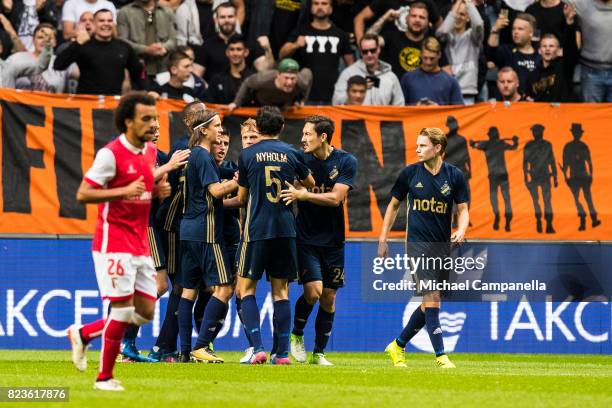 Players of AIK celebrate scoring the equalizing goal during a UEFA Europa League qualification match between AIK and SC Braga at Friends arena on...