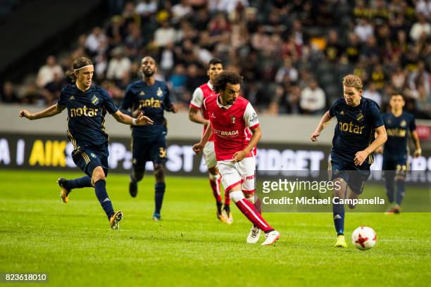 Fabio Santos Martins of SC Braga plays the ball forward during a UEFA Europa League qualification match between AIK and SC Braga at Friends arena on...