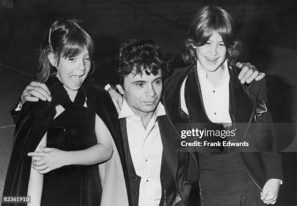 American actor Robert Blake poses with his children Delinah and Noah at the Emmy Awards in Pasadena, September 1977.