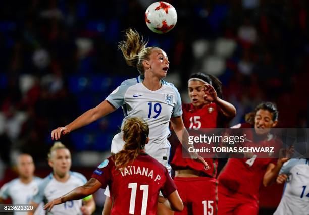 England's forward Toni Duggan and Portugal's defender Carole Costa head the ball during the UEFA Women's Euro 2017 football match between Portugal...