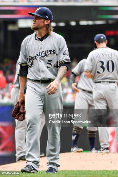 Milwaukee Brewers starting pitcher Michael Blazek is taken out of the game in the third inning by manager Craig Counsell after surrendering five home...