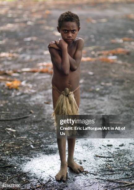 Boy wearing a penis sheath called a namba suffering from the cold, Tanna island, Yakel, Vanuatu on September 6, 2007 in Yakel, Vanuatu.