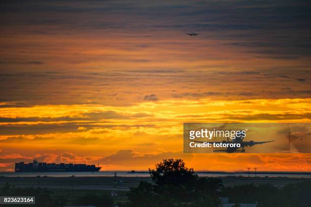 vancouver international airport (yvr) at sunset in vancouver bc canada - yvr airport stock pictures, royalty-free photos & images
