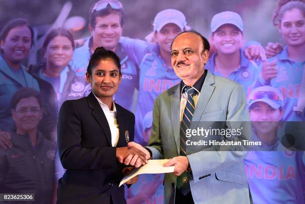 Indian Women's Cricket team captain Mithali Raj with BCCI Acting President C. K. Khanna during the felicitating event on July 27, 2017 in New Delhi,...