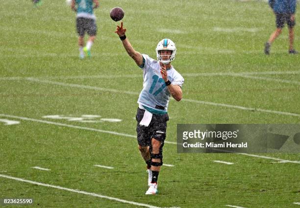 Miami Dolphins quarterback Ryan Tannehill throws the ball during a passing drill at OTAs on Monday, June 5, 2017 at the Miami Dolphins training...