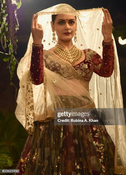 Dia Mirza walks for Anju Modi at FDCI's India Couture Week 2017 at the Taj Palace hotel on July 27, 2017 in New Delhi, India.