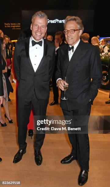Torsten Muller-Otvos, Chief Executive, Rolls-Royce Motor Cars, and Lord Charles March attend the world premiere of the 'The Great Eight Phantoms - A...