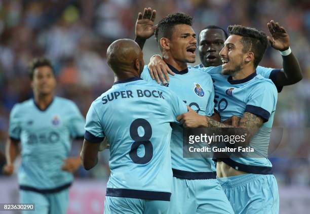 Porto forward Soares from Brazil celebrates with teammates after scoring a goal during the Pre-Season Friendly match between Portimonense SC and FC...