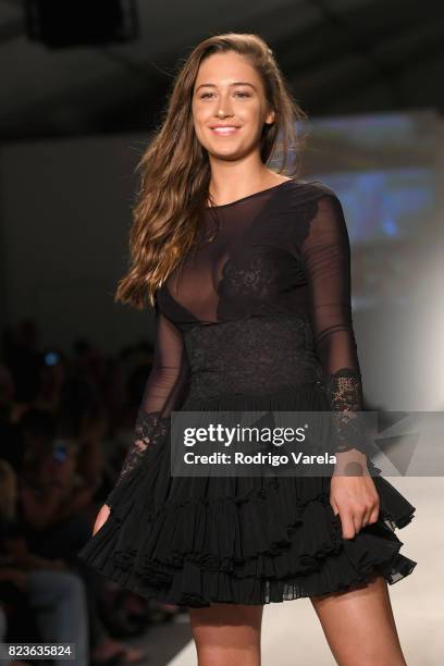 Model walks the runway at the SWIMMIAMI Hot-As-Hell 2018 Collection fashion show at 227 22nd Street on July 21, 2017 in Miami Beach, Florida.