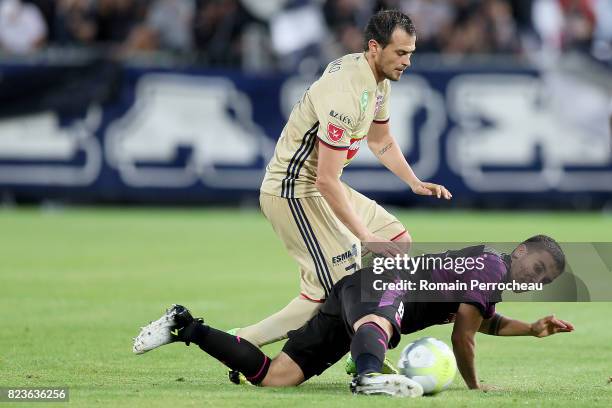 Mauro Arambarri of Bordeaux and Danko Lazovic of Videoton in action during the UEFA Europa League qualifying match between Bordeaux and Videoton at...