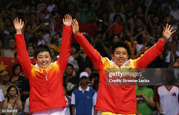 Du Jing and Yu Yang of China celebrate the gold medal in the Women's Doubles at the Beijing University of Technology Gymnasium on Day 7 of the...