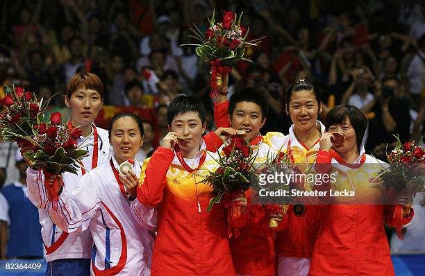 Silver medalists Lee Hyojung and Lee Kyungwon of South Korea, gold medalists Yu Yang and Du Jing of China and bronze medalists Wei Yili and Zhang...