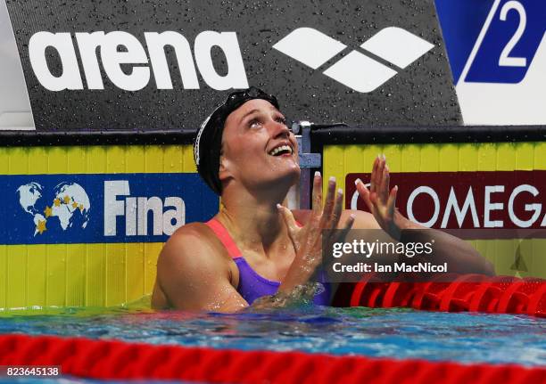 Mireia Belmonte of Spain reacts after she wins the Women's 200m Butterfly final on day fourteen of the FINA World Championships at the Duna Arena on...