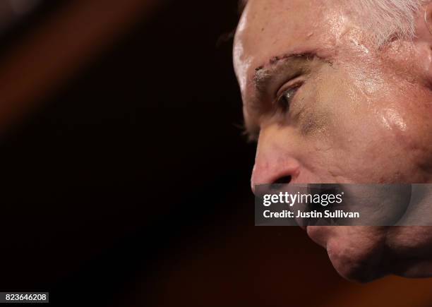 Sen. John McCain looks on during a news conference to announce opposition to the so-called skinny repeal of Obamacare at the U.S. Capitol July 27,...