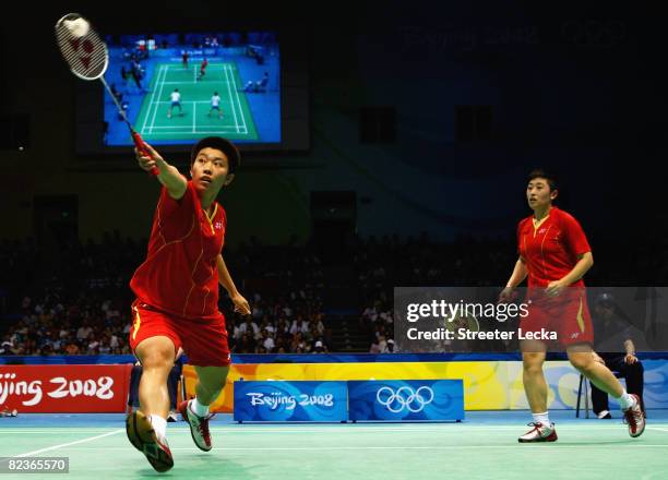 Du Jing and Yu Yang of China in action against Lee Hyojung and Lee Kyungwon of South Korea during the Women's Doubles Final at the Beijing University...