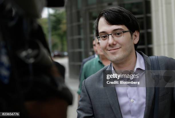 Martin Shkreli, former chief executive officer of Turing Pharmaceuticals AG, exits federal court in the Brooklyn borough of New York, U.S., on...