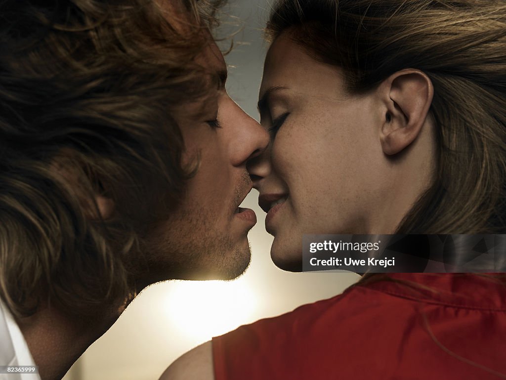 Couple about to kiss, close up