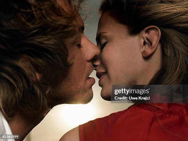 couple about to kiss, close up - pecking imagens e fotografias de stock