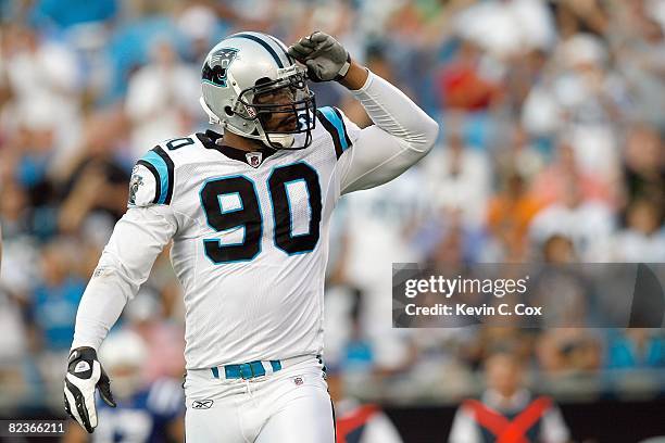 Julius Peppers of the Carolina Panthers motions on the field during the game against the Indianapolis Colts at Bank of America Stadium on August 2008...