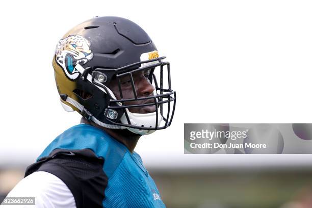 Tackle Cam Robinson of the Jacksonville Jaguars works out during Training Camp at Florida Blue Health and Wellness Practice Fields on July 27, 2017...