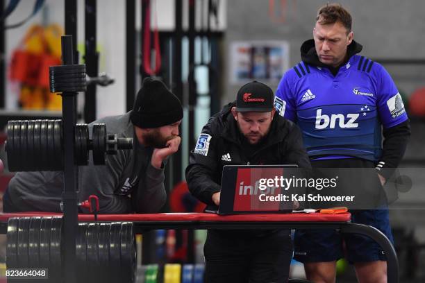 Joe Moody, Assistant Coach Jason Ryan and Wyatt Crockett look on during a Crusaders Super Rugby captain's run at Rugby Park on July 28, 2017 in...