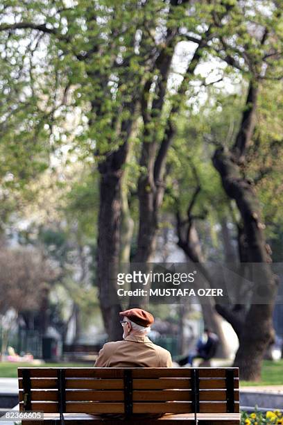 This file picture taken on April 3 in Istanbul shows an elderly Turkish man sitting on a bench during a sunny day in Bebek Park. The last time Derek...