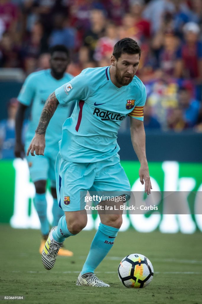 Lionel Messi of Barcelona drives toward the goal at the start of the