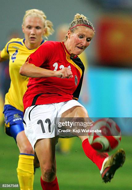 Anja Mittag of Germany controls the ball during the Women's Quarter Final match between Sweden and Germany at Shenyang Olympic Stadium on Day 7 of...