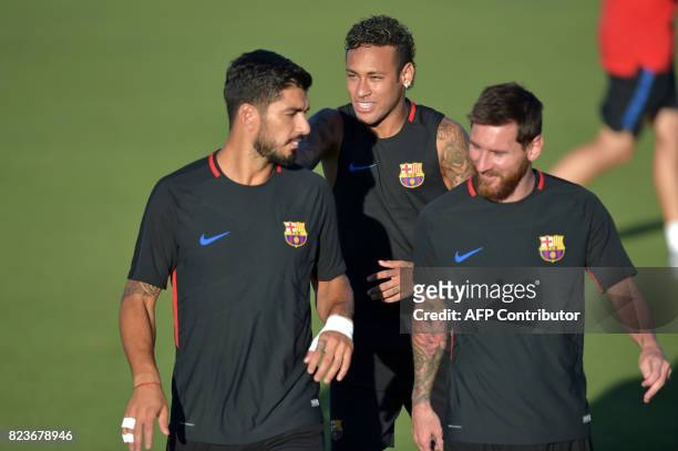 Barcelona players Luis Suarez , Neymar and Lionel Messi take part in a training session at Barry University in Miami, Florida, on July 27 two days...