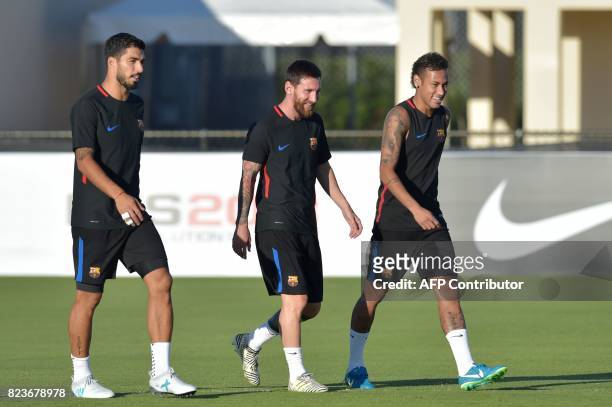 Barcelona players Luis Suarez , Lionel Messi and Neymar take part in a training session at Barry University in Miami, Florida, on July 27 two days...