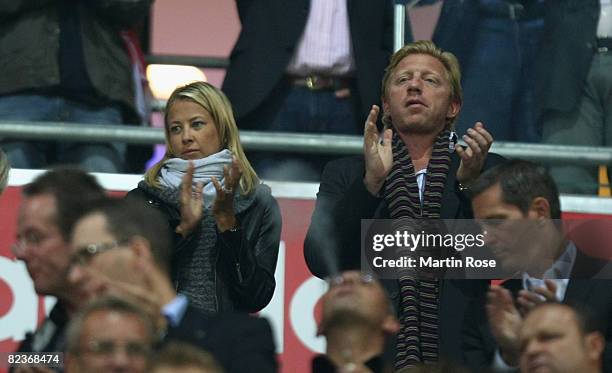 Boris Becker and Sandy Meyer Woelden seen during the Bundesliga match between Bayern Muenchen and Hamburger SV at the Allianz Arena on August 15,...