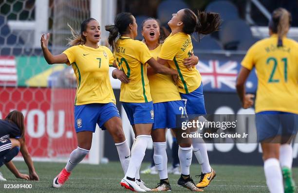 Camila of Brazil celebrates with teammates after scoring a goal against Japan during the 2017 Tournament of Nations at CenturyLink Field on July 27,...