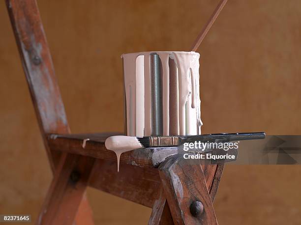 paint pot on ladder - home renovation stock pictures, royalty-free photos & images