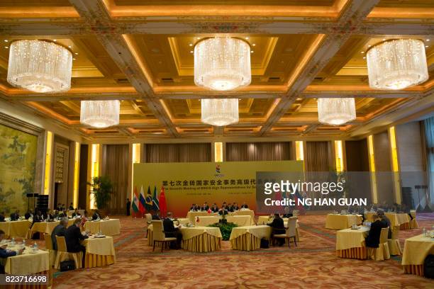 Chinese State Councilor Yang Jiechi hosts the seventh meeting of BRICS senior representatives on security issues held at the Diaoyutai state...