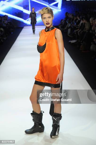 Models showcases designs by Daniel Avakian on the catwalk during the New Guarde group collection as part of the inaugural Rosemount Sydney Fashion...