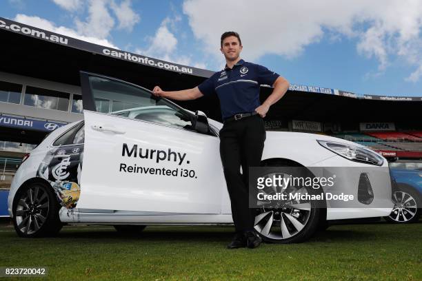 Blues Captain Marc Murphy poses with a Hyundai car after the club signed a new five year sponsor agreement with the car maker during a Carlton Blues...