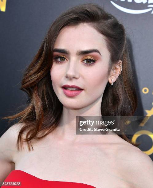 Lily Collins arrives at the Premiere Of Amazon Studios' "The Last Tycoon" at the Harmony Gold Preview House and Theater on July 27, 2017 in...