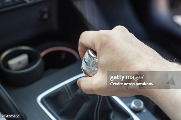 manual gear shift knob - hand cog stock pictures, royalty-free photos & images