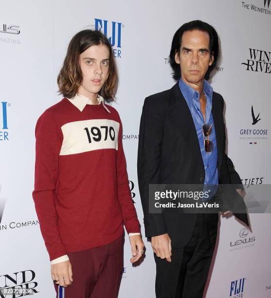 Musician Nick Cave and son Earl Cave attend the premiere of "Wind River" at The Theatre at Ace Hotel on July 26, 2017 in Los Angeles, California.