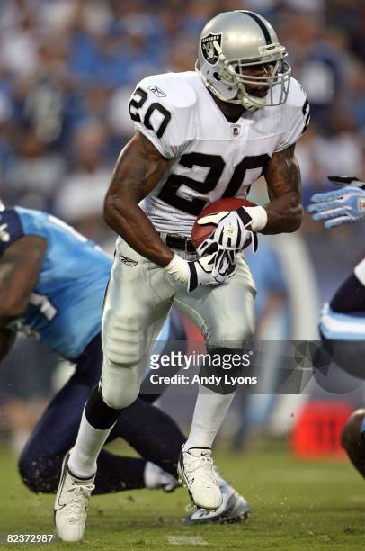 Darren McFadden of the Oakland Raiders runs with the ball during the NFL pre-season game against the Tennessee Titans at LP Field August 15, 2008 in...